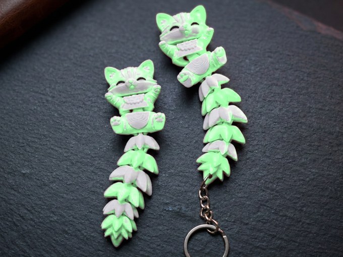 Glow in the dark flexi cat keychain