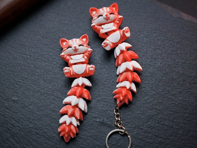 Red flexi cat keychain